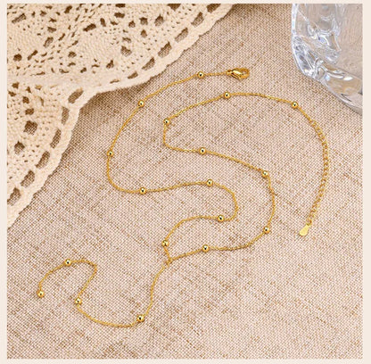 Athéna: Long collier en chaîne avec pendentif