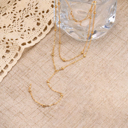 Athéna: Long collier en chaîne avec pendentif